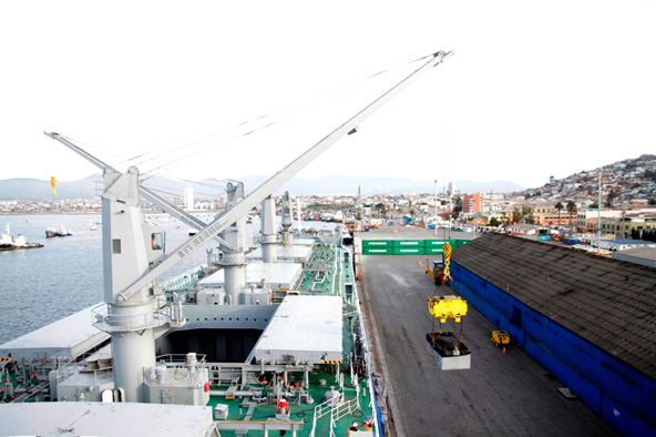 Loading the initial shipment of Caserones copper concentrate onto the Koryu carrier ship